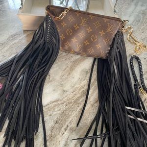 Louis Vuitton fringed pochette crossbody/clutch